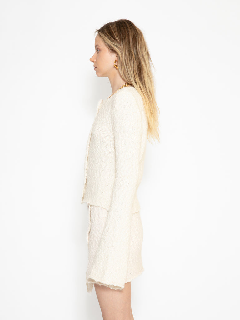 Louise alpaca wool cardigan from lateral side paired with Thelma alpaca wool skirt