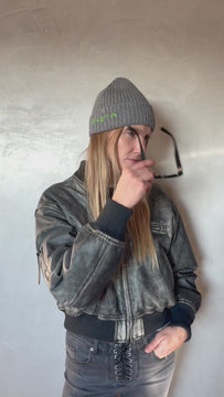 Video of the Milano black cashmere hat styled together with a selection of other cashmere hat colors, part of a slow-fashion luxury accessories collection