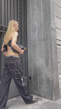 Video of the Saint-Tropez silk satin top in motion showing shine and elegance, ideal for evening dress styling