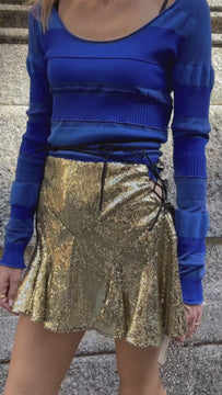 Video of the Mary gold sequin mini skirt styled for party dress code