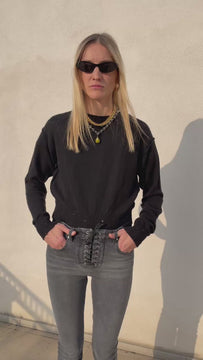 Video of the Billie pink cashmere sweater in motion showing fit, a perfect piece for glam rock fashion and cool clothing brands lovers