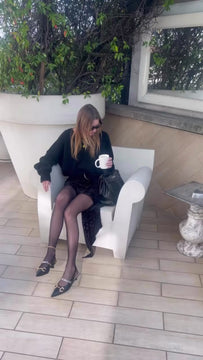 Video of the Lilith black oversize cashmere sweater styled as a glam rock outfit, a statement piece from a cool clothing brand