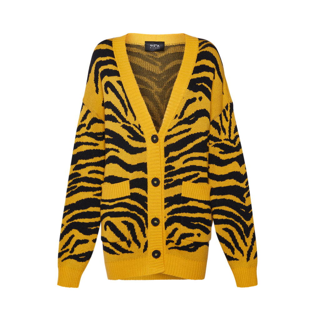 Georgia yellow and black tiger-jacquard long cardigan. Made in Italy. Secured Payment. Extended Returns. Cardigan. Cashmere blend cardigan. Long cashmere cardigan. Cashmere knitwear. Cardigan sweater. Cashmere cardigan. Cashmere cardigan woman. Cashmere sweater. Cardigan sweater. Best cashmere sweaters. Tiger sweater. Chunky sweater. Rocker. Slow fashion. Luxury clothing brands. Cool clothing brands. Pull cardigan. Strickwaren. 